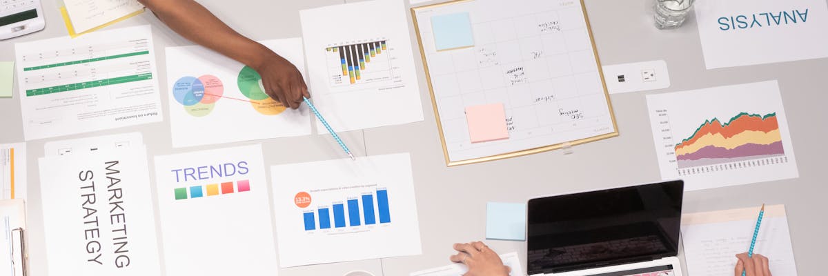 Startup founder comparing competitive intelligence platforms on a laptop screen