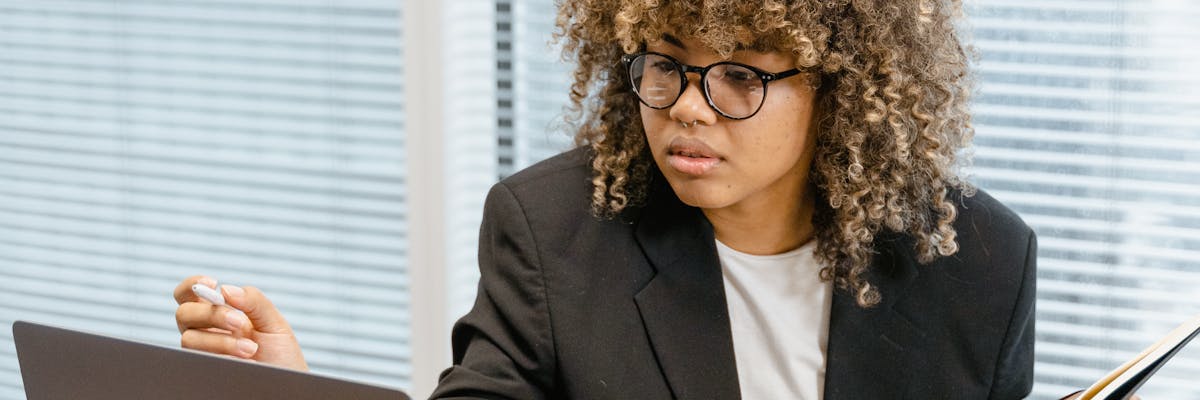 Business analyst comparing competitor pricing models and strategies