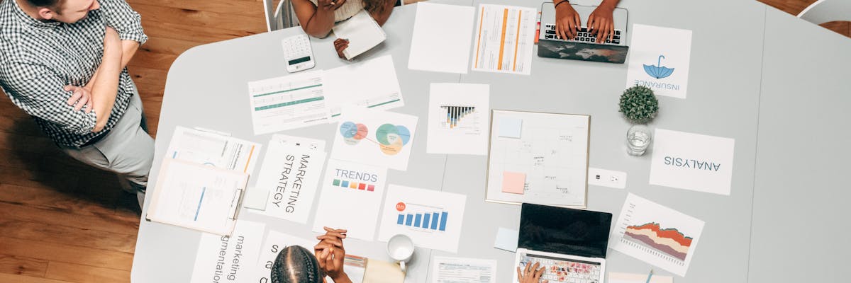 Marketing analyst reviewing competitor messaging documents and positioning statements