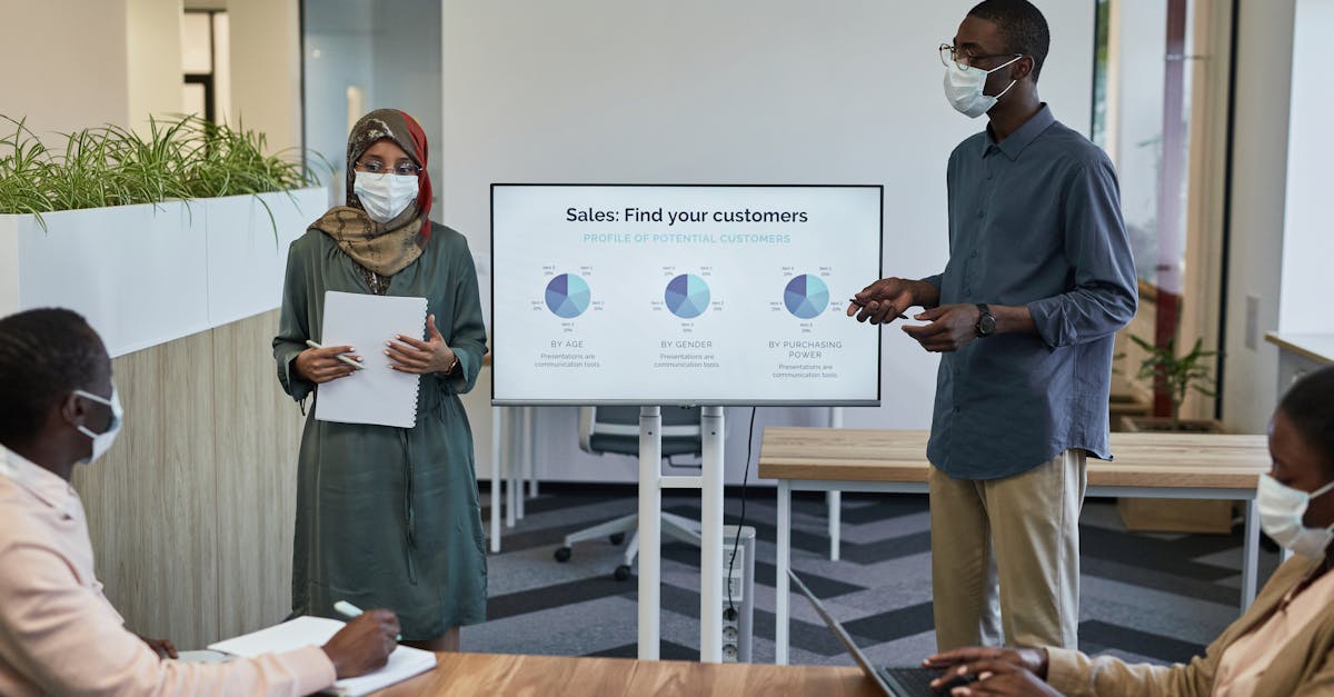 Sales rep presenting a product demo with competitive intelligence notes nearby