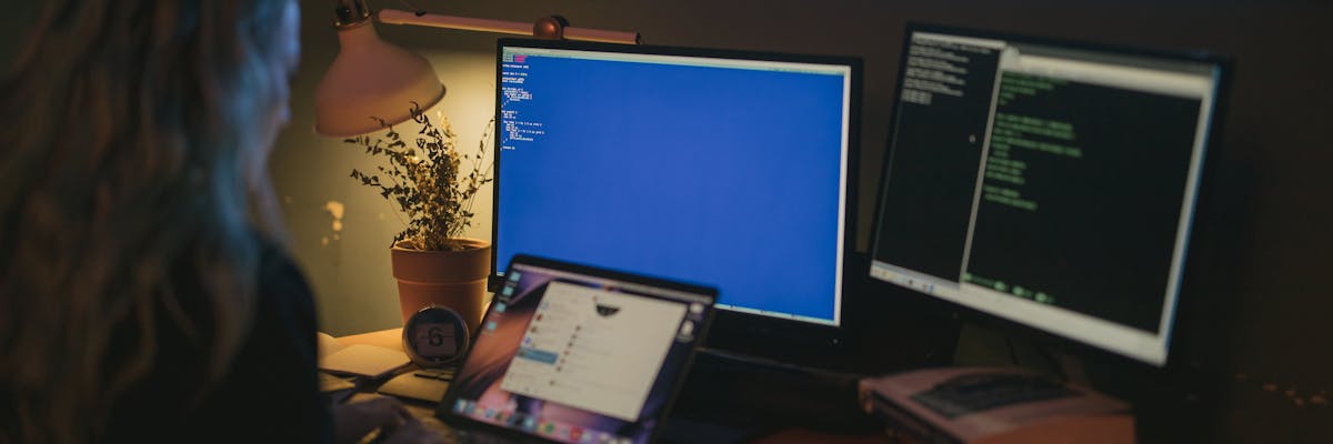 Startup founder using affordable sales enablement tools on a desktop computer
