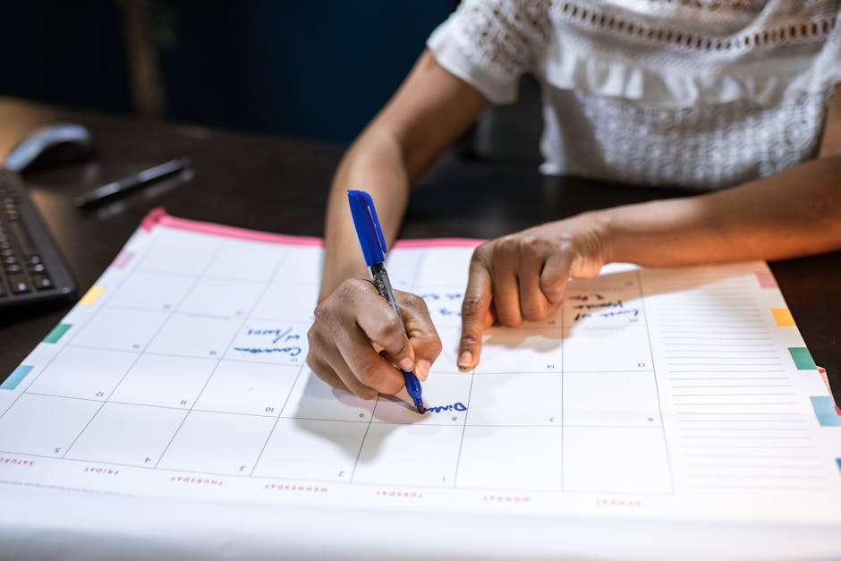 Sales operations manager reviewing a calendar and battlecard update schedule